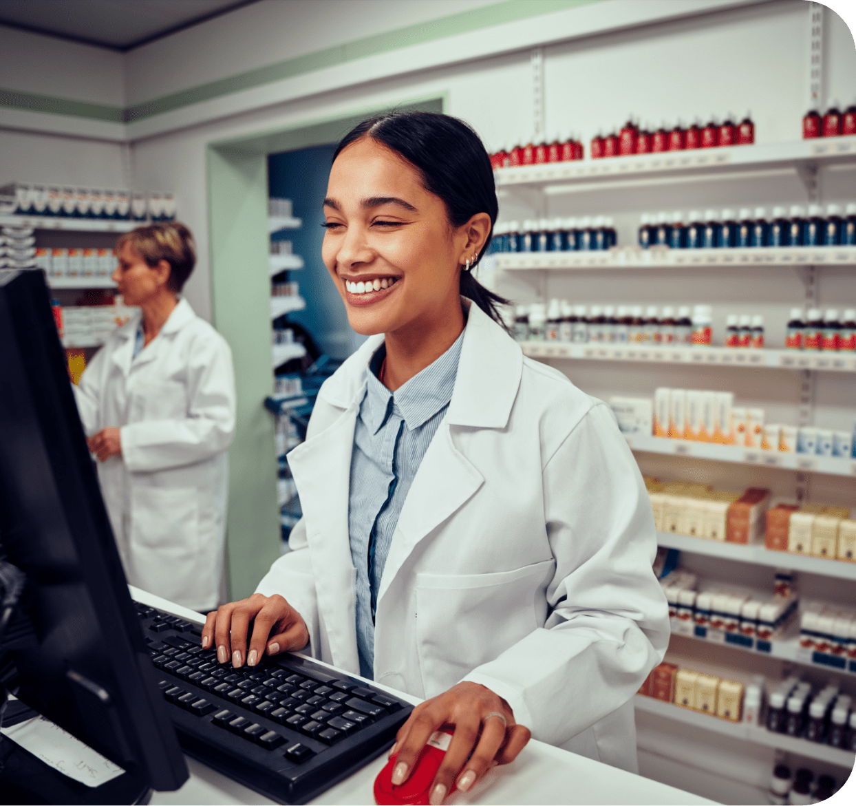 Smiling pharmacy lady at register