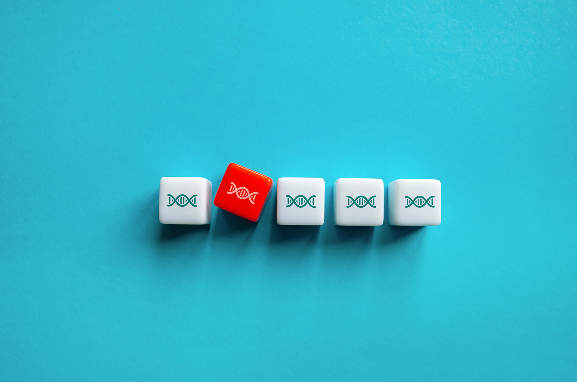 Red DNA marker cube standing out among white DNA cubes on a bright blue background.